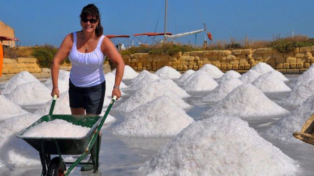 Great photo of our guest appearing to do a lot of heavy lifting. We do harvest salt - but not all of that! 